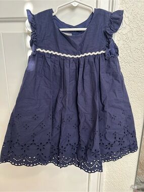 Pastourelle Navy Eyelet Ruffle Sleeve shirt.